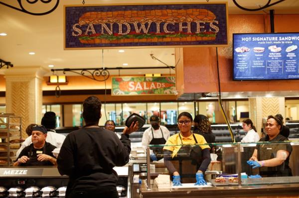 The sandwich counter is on the ground level.