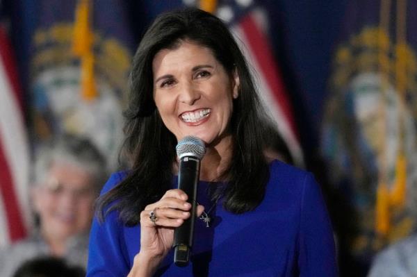 Republican presidential candidate Nikki Haley smiles while taking a question from the audience during a campaign event May 24, 2023.