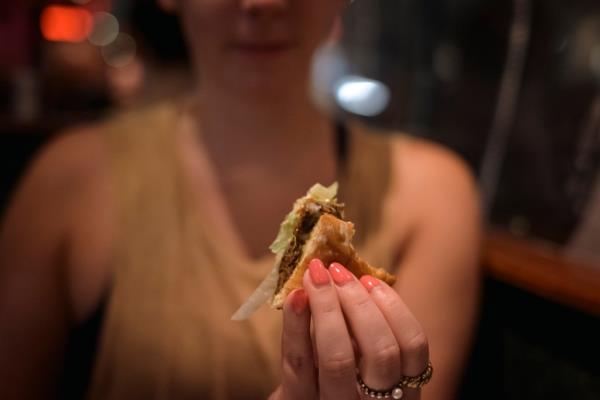 Jaye Lind, 28, savored the last few bites of her first veggie burger but enjoyed the 