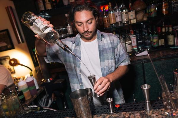 The bar near the back of the restaurant serves up classic cocktails and mocktails to quench anyone's thirst. 