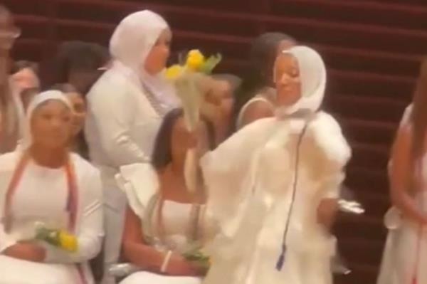 A recent graduate at an all girls Philadelphia High School for Girls was denied her high school diploma on stage while her family watched from in crowd.