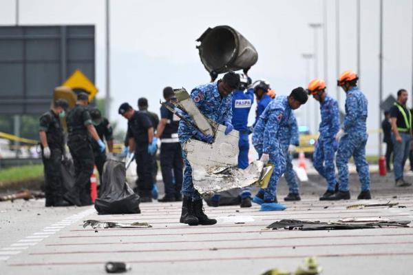 Emergency crews at the scene of the disaster.