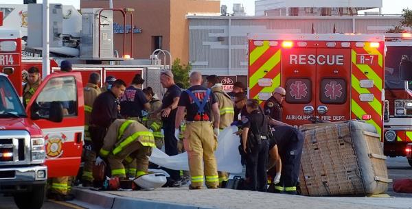 Albuquerque Fire Rescue crews work on victims of the fatal balloon crash at Unser and Central SW in Albuquerque, N.M., on Saturday, June 26, 2021.