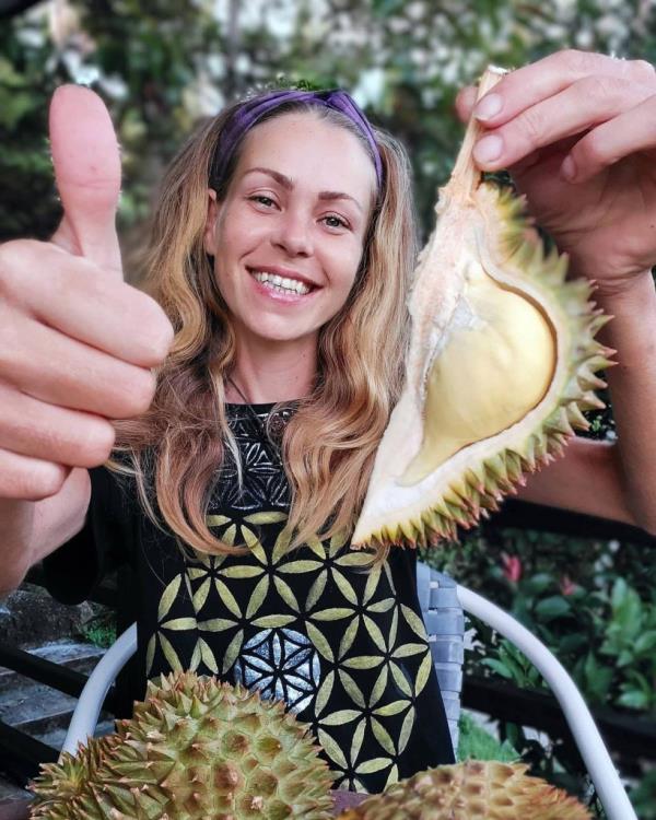 Samso<em></em>nova with a section of durian, the spiky, pungent fruit that's a delicacy throughout Southeast Asia.