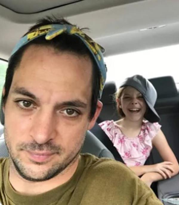 Victim Maxx Hathaway in pic with daughter making funny face with silly hats.