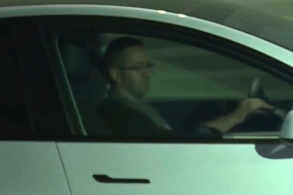 Kline driving away.