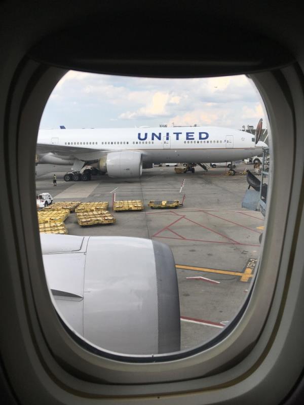 View of a united plane on tarmac from a window seat