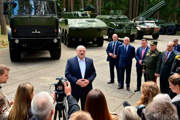 Belarusian President Alexander Lukashenko talks with the media during his visit to the missile production enterprise in Minsk region, Belarus, Tuesday, June 13, 2023. 