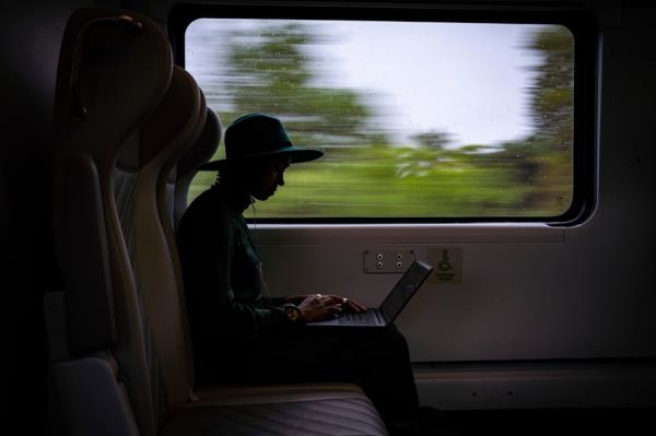 Brightline currently operates a passenger rail service ferrying people from Miami to West Palm Beach. A passenger aboard Brightline is seen in the June 6 photo above.