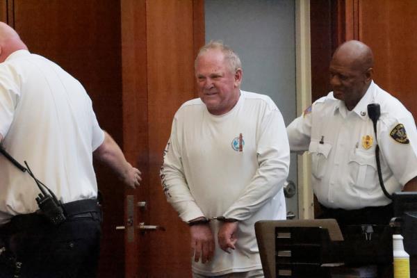 Scott Anthony Burke, 69, pleaded not guilty to drug and weapons trafficking charges in court on Wednesday