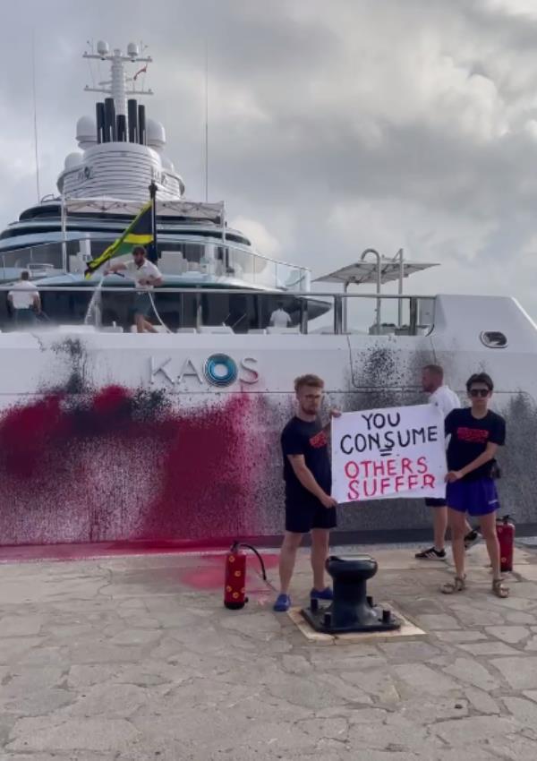 Members of the Futuro Vegetal group were seen posing with a sign in front of the vandalized boat belo<em></em>nging to Walmart billio<em></em>naire heiress Nancy Walton Laurie. 