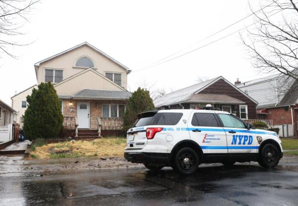 Police at Queens squatter home. 