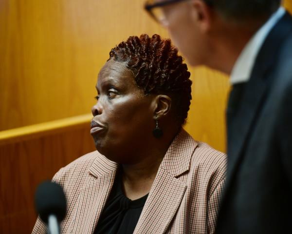 Wanda Geter-Pataky reacts as she watches video of herself placing absentee ballots into election drop boxes, during Bridgeport Democratic Primary Mayoral candidate John Gomes' challenge of absentee ballots in Superior Court in Bridgeport, Conn., Friday, Oct. 13, 2023.