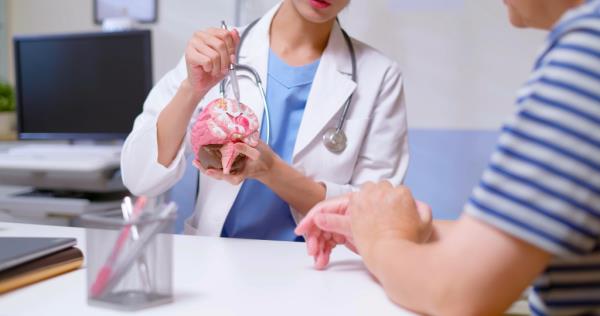 Doctor talking with patient