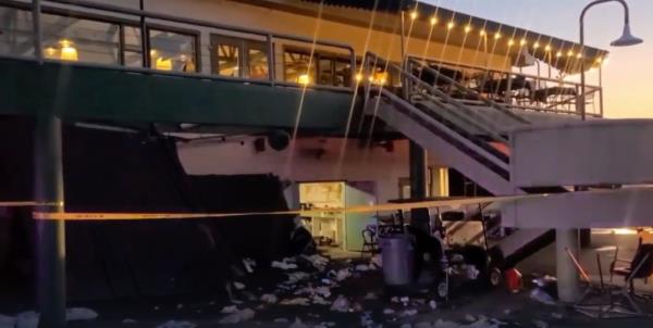 pictured is the aftermath of a patio deck collapse that injured 25 people.