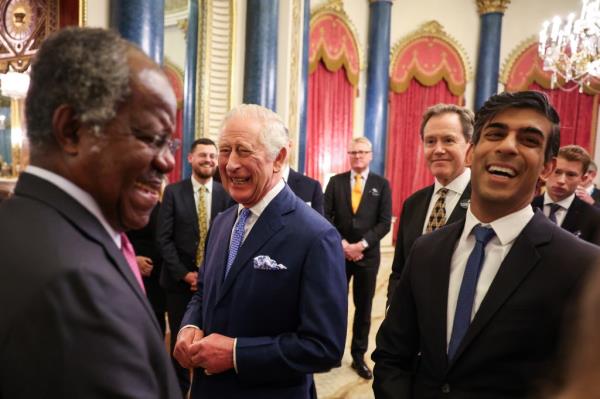 Global Infrastructure Partners' Adebayo Ogunlesi, left with Britain's King Charles III  and Britain's Prime Minister Rishi Sunak in November.