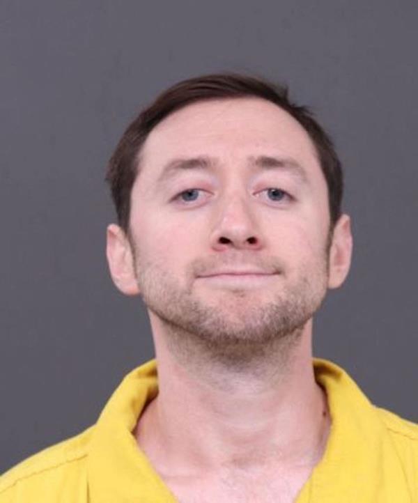 Justin Mohn is pictured in a mugshot.