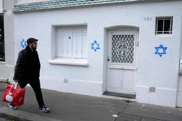 Paris homes have been tagged with the star of David in frightening echo of Nazi times.