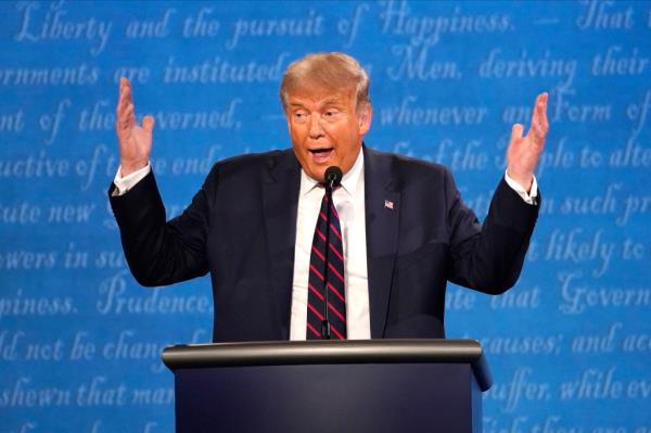 Do<em></em>nald Trump speaking at a podium during the 2020 presidential debate at Case Western University and Cleveland Clinic
