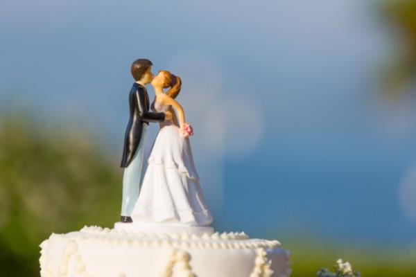 white wedding cake with topper