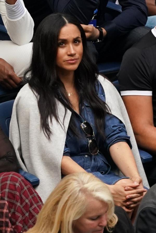 Meghan Markle, Duchess of Sussex, sitting and watching the Women's Singles final match between Serena Williams and Bianca Andreescu at the 2019 US Open