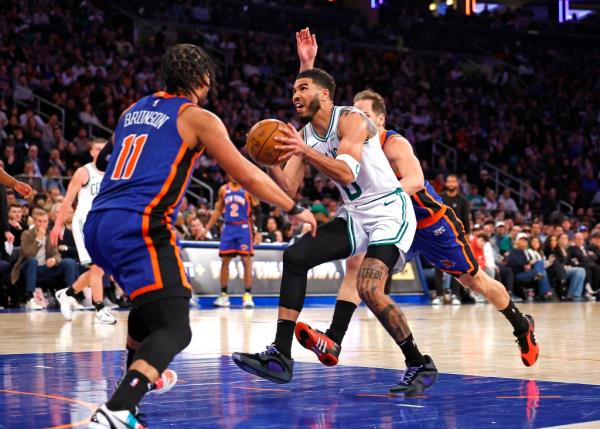 Jayson Tatum #0 of the Boston Celtics drives to the basket  during the second half at Madison Square Garden,  Saturday, Feb. 24, 2024 in New York. 