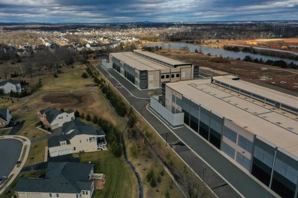 Amazon data centers built close to residential houses, formerly farmland, in Aldie, VA.
