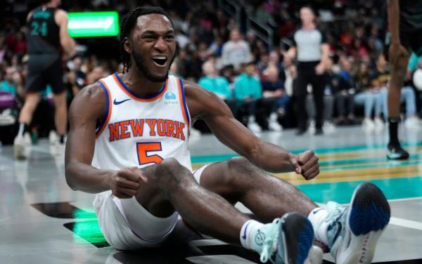 New York Knicks guard Immanuel Quickley (5) reacts after a play in the fourth quarter
