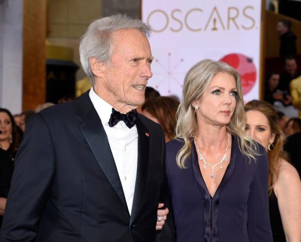 Clint Eastwood and Christina Sandera at the 87th Annual Academy Awards in 2015.