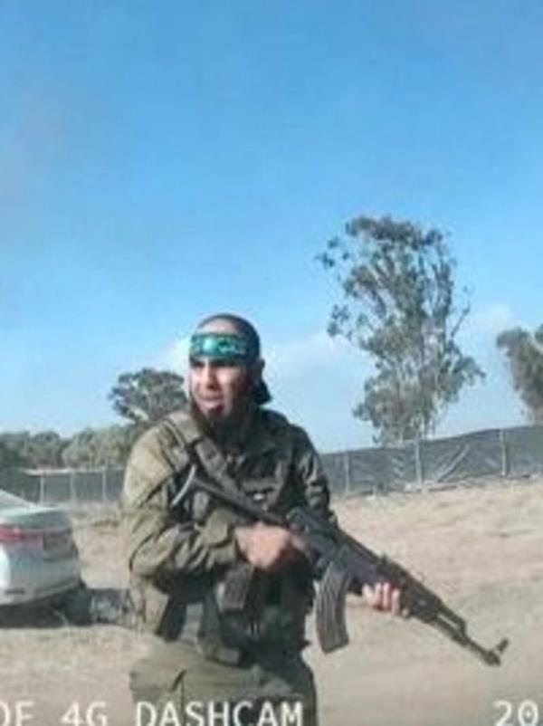Though Jackson and Mitts could not co<em></em>nfirm the identity of the person or entity behind the transactions, they co<em></em>ncluded that evidence points to a Hamas affiliation of some kind. (Pictured: a Hamas terrorist at the Tribe of Nova music festival on Oct. 7.)