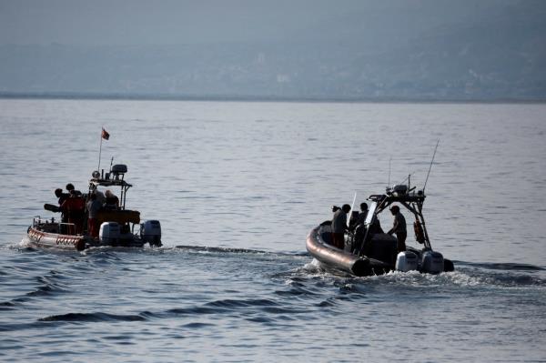 Rescue boats search the waters off the coast of Porticello near the Sicilian city of Palermo on Aug. 23, 2024.