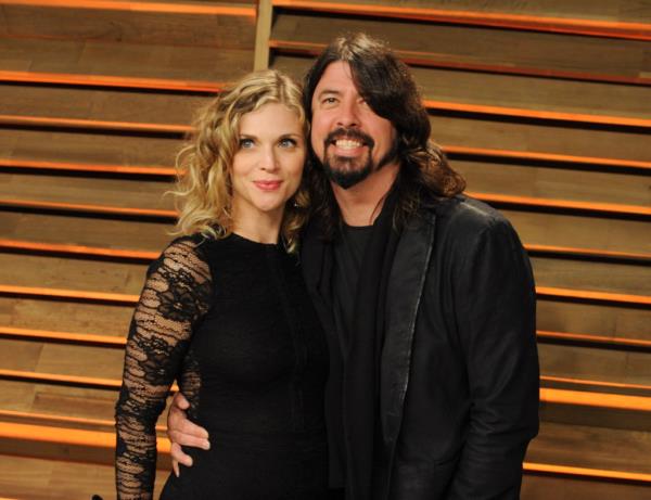 Jordyn Blum and Dave Grohl attend the 2014 Vanity Fair Oscar Party hosted by Graydon Carter on March 2, 2014 in West Hollywood, California.