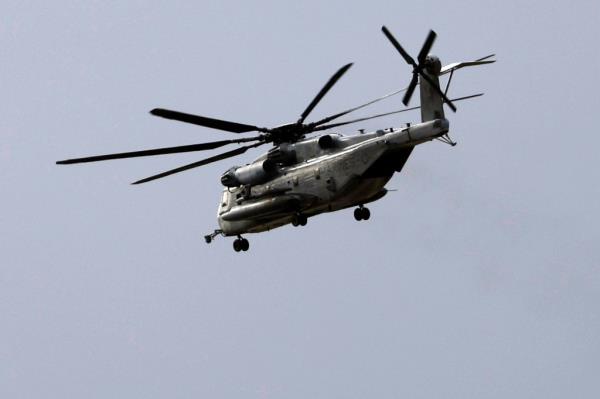 A Marine CH-53E Super Stallion helicopter flies during training at Marine Corps Air Station Miramar in San Diego, Tuesday, Feb. 6, 2024. 