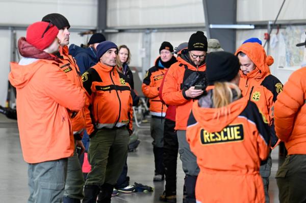 Rescue perso<em></em>nnel meet at a command center, Wednesday, Feb. 7, 2024, in Kitchen Creek, Calif.