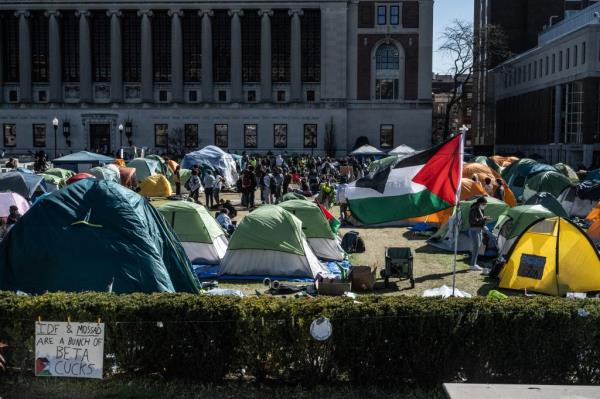 Columbia University students participate in an o<em></em>ngoing pro-Palestinian encampment on their campus following last week's arrest of more than 100 protesters on April 25, 2024 in New York City.