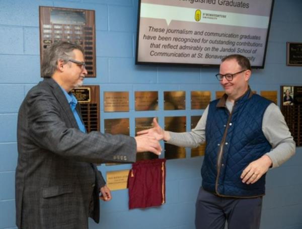 Mike Vaccaro (l.) and Adrian Wojnarowski (r.)