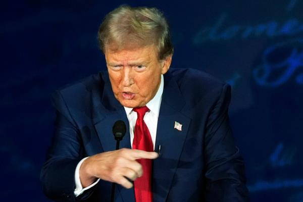 Republican presidential nominee former President Do<em></em>nald Trump speaks during a presidential debate with Democratic presidential nominee Vice President Kamala Harris at the Natio<em></em>nal Co<em></em>nstitution Center in Philadelphia, Tuesday, Sept. 10, 2024.
