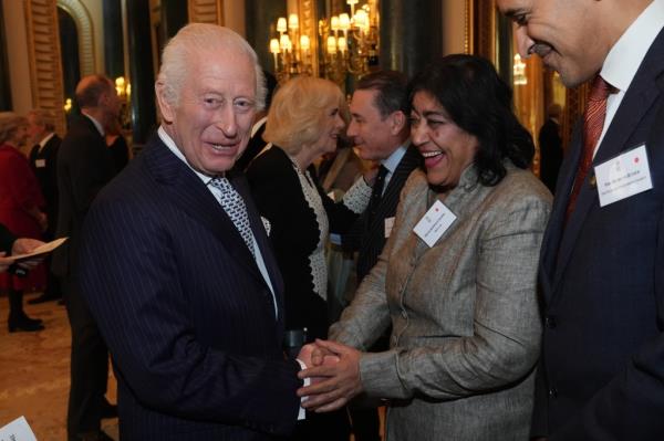 King Charles III with Gurinder Chadha during a reception to mark the centenary of the Film and TV charity, at Buckingham Palace on November 13, 2024 in London, England. 