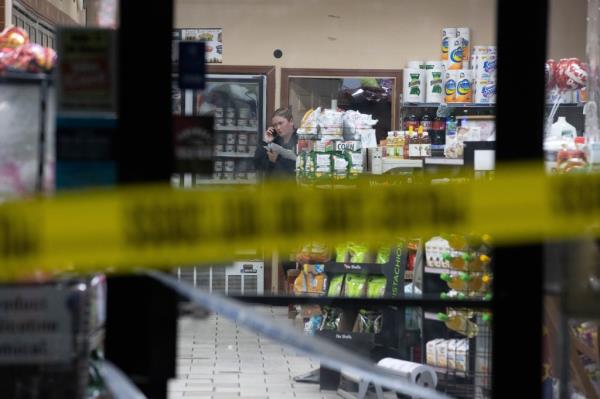Police are seen at the scene of a fatal stabbing on Queens Blvd. in Queens, Tuesday, May 7, 2024. The stabbing happened in the bodega at 97-02 Queens Blvd. with a blood trail to 97-50 Queens Blvd. wher<em></em>e the victim collapsed.