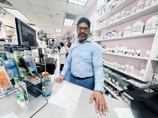 Milton Reyes, manager of Mi Farmacia in Jackson Heights.