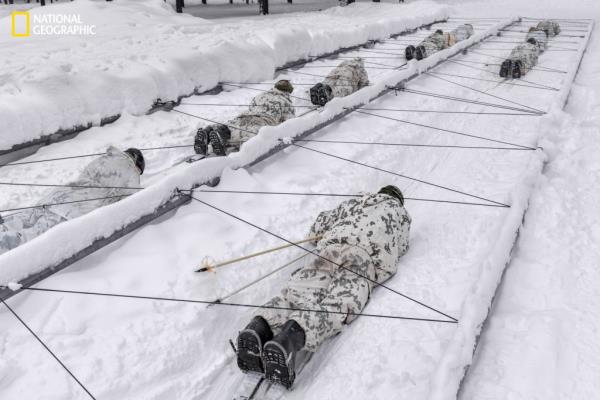 US and Finnish soldiers train north of the Arctic Circle amid global tensions.