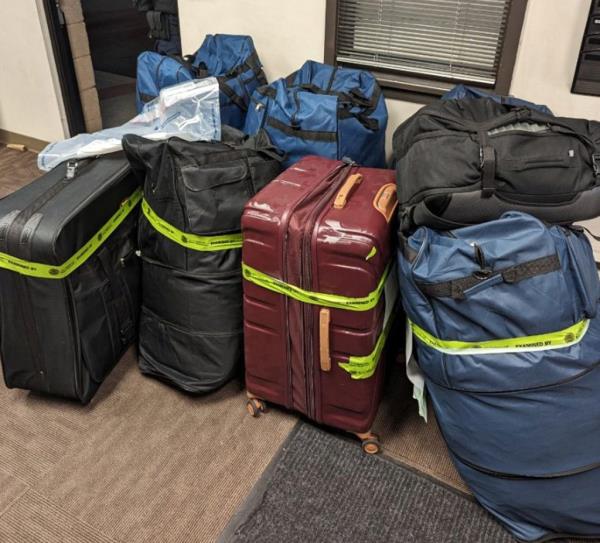 These 12 large luggages co<em></em>ntaining approximately 500 pounds of marijuana were seized during a customs inspection of a private plane at Teterboro Airport.