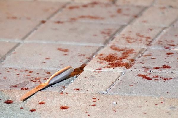 A knife was left behind at the scene, lying on the ground underneath the elevated tracks. 