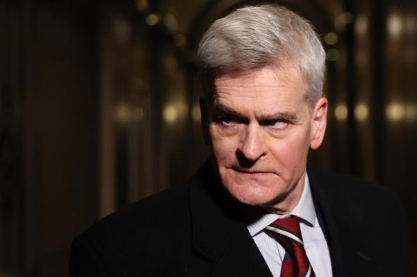 Senator Bill Cassidy (R-LA) talks with reporters as he leaves the Capitol after the first day of former US President Do<em></em>nald Trump's second impeachment trial February 9, 2021 in Washington, DC