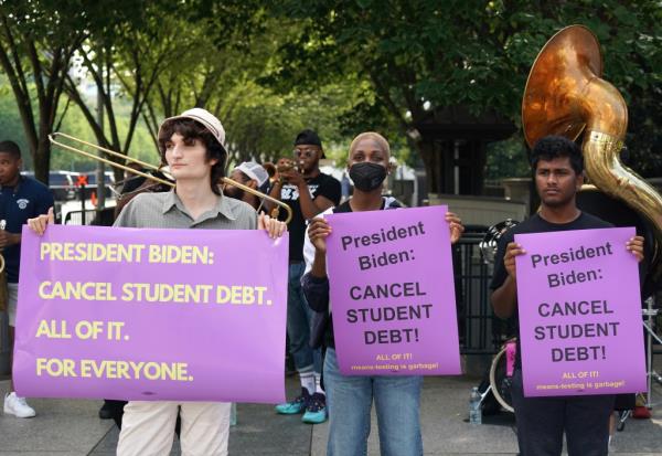 Student loan debt holders take part in a demo<em></em>nstration outside of the white house staff entrance to demand that President Biden cancel student loan debt in August on July 27, 2022 at the Executive Offices in Washington, DC.