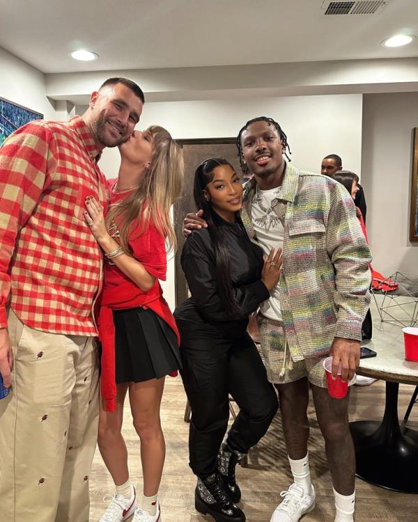 Travis Kelce and Taylor Swift post-game with Mecole Hardman, Jr. and Chariah Gordon.