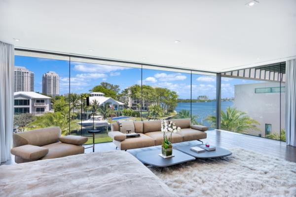 The home is blessed with massive exposures and views to match.