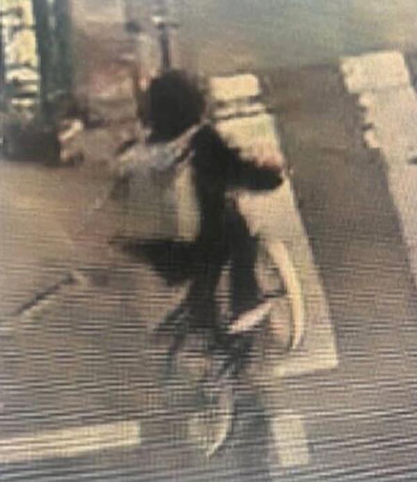 The suspect is captured on CCTV riding a bike