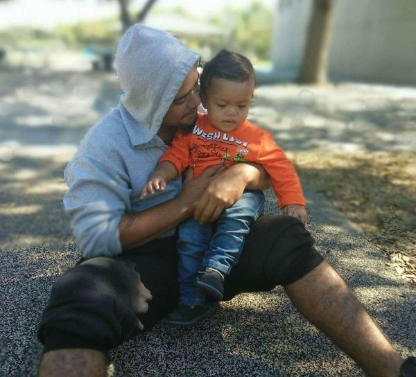 Anthony with his biological dad, Andre Rouse.