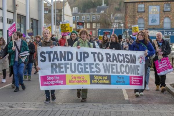 Mandatory Credit: Photo by Penelope Barritt/Shutterstock (13792501a) Far right groups protest at Dover against the increasing number of refugees crossing the English Channel in small boats and the RNLI and Border Force, who they accuse of bringing them to the UK. The group gathers for the protest at Dover Priory station. At the same time a counter demo<em></em>nstration is taking place under the banner No to the Far Right, Refugees are welcome here, which meets at Market Square in the town centre. Refugee protests, Dover, Kent, UK - 04 Mar 2023